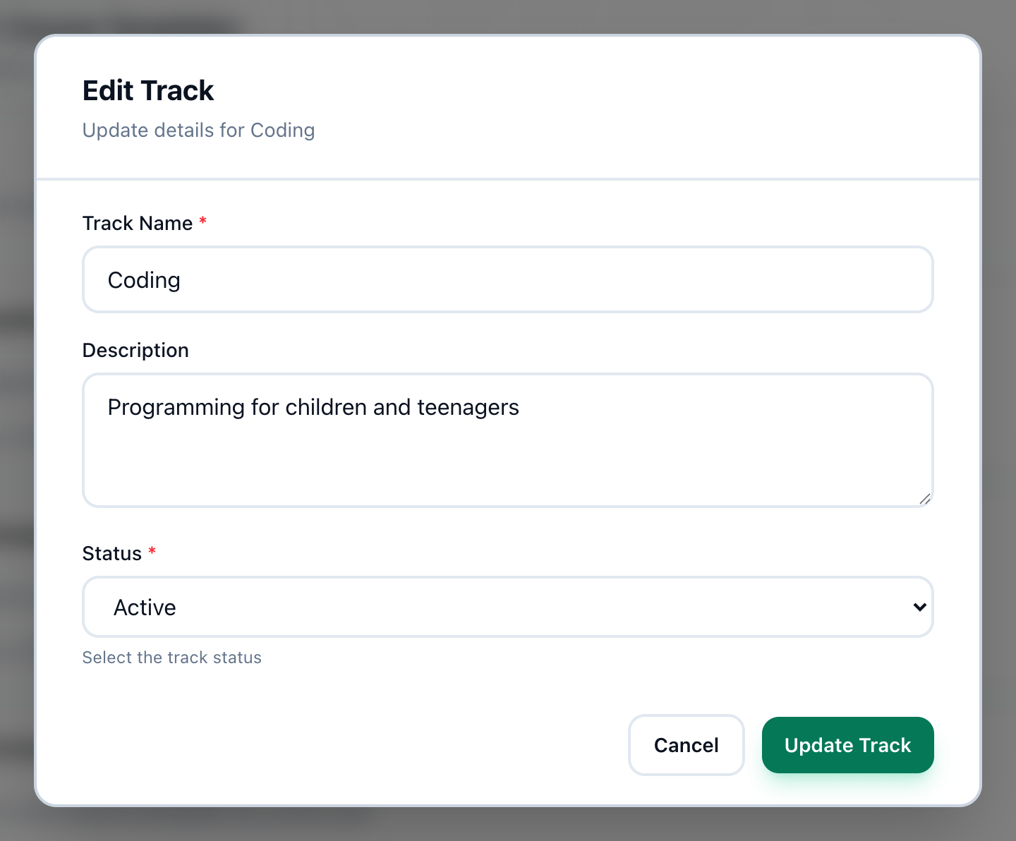 The Edit Track dialog for Coding, with the Status field and the Update Track button highlighted