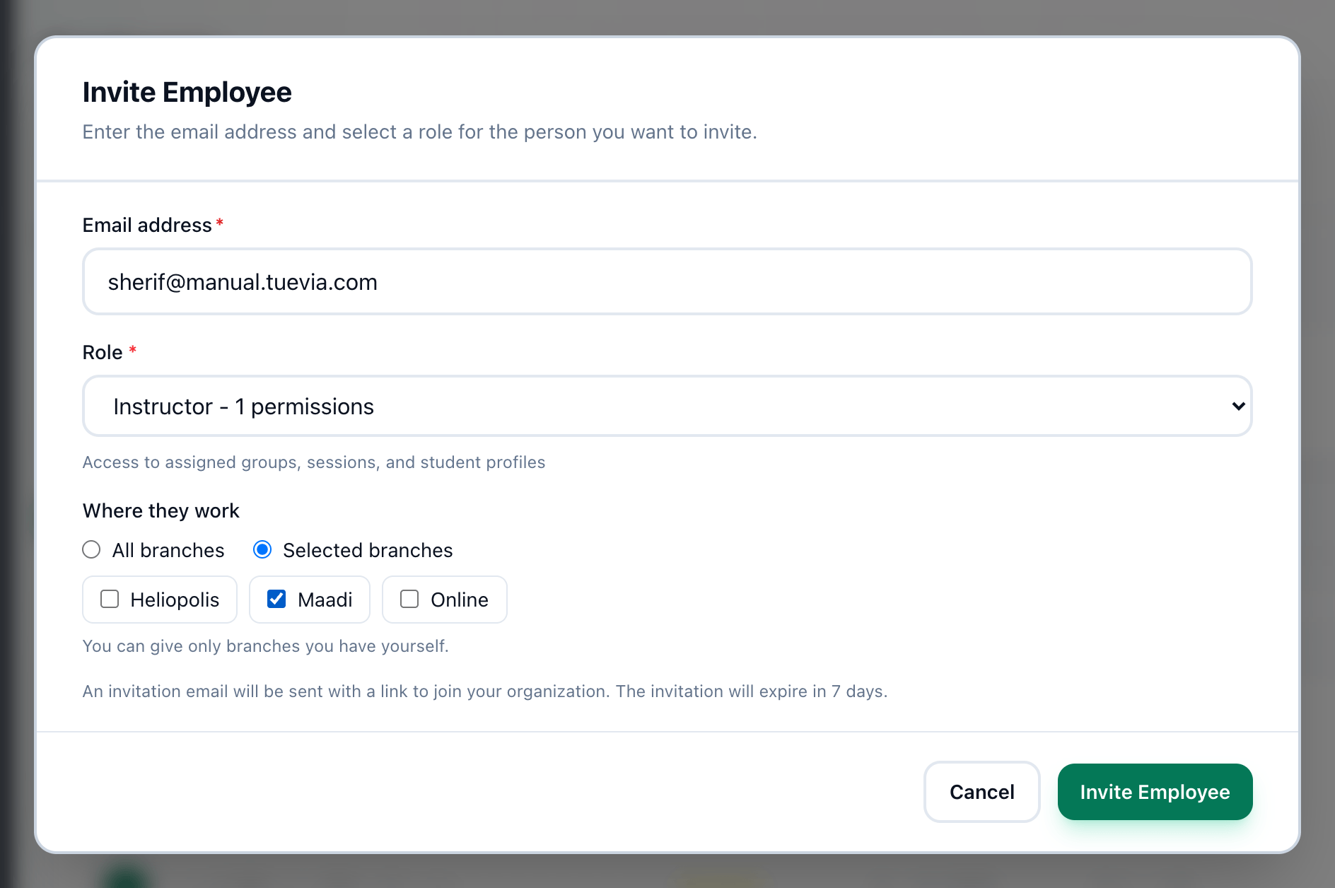 The Invite Employee dialog filled in, with the email address, the role, where they work and the Invite Employee button highlighted